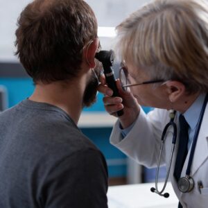 Patient undergoing auditory processing disorder testing at Harley AVM London