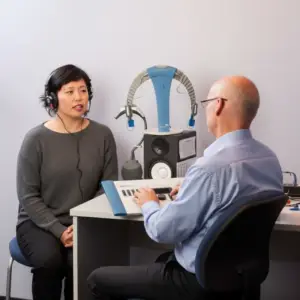Audiologist conducting auditory processing evaluation in London